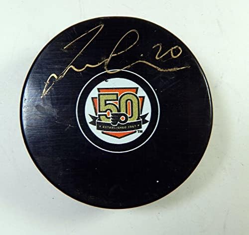 Taylor Leier 20 a semnat Philadelphia Flyers 50th Anniversary Hockey Puck Auto 42-autografe NHL Pucks